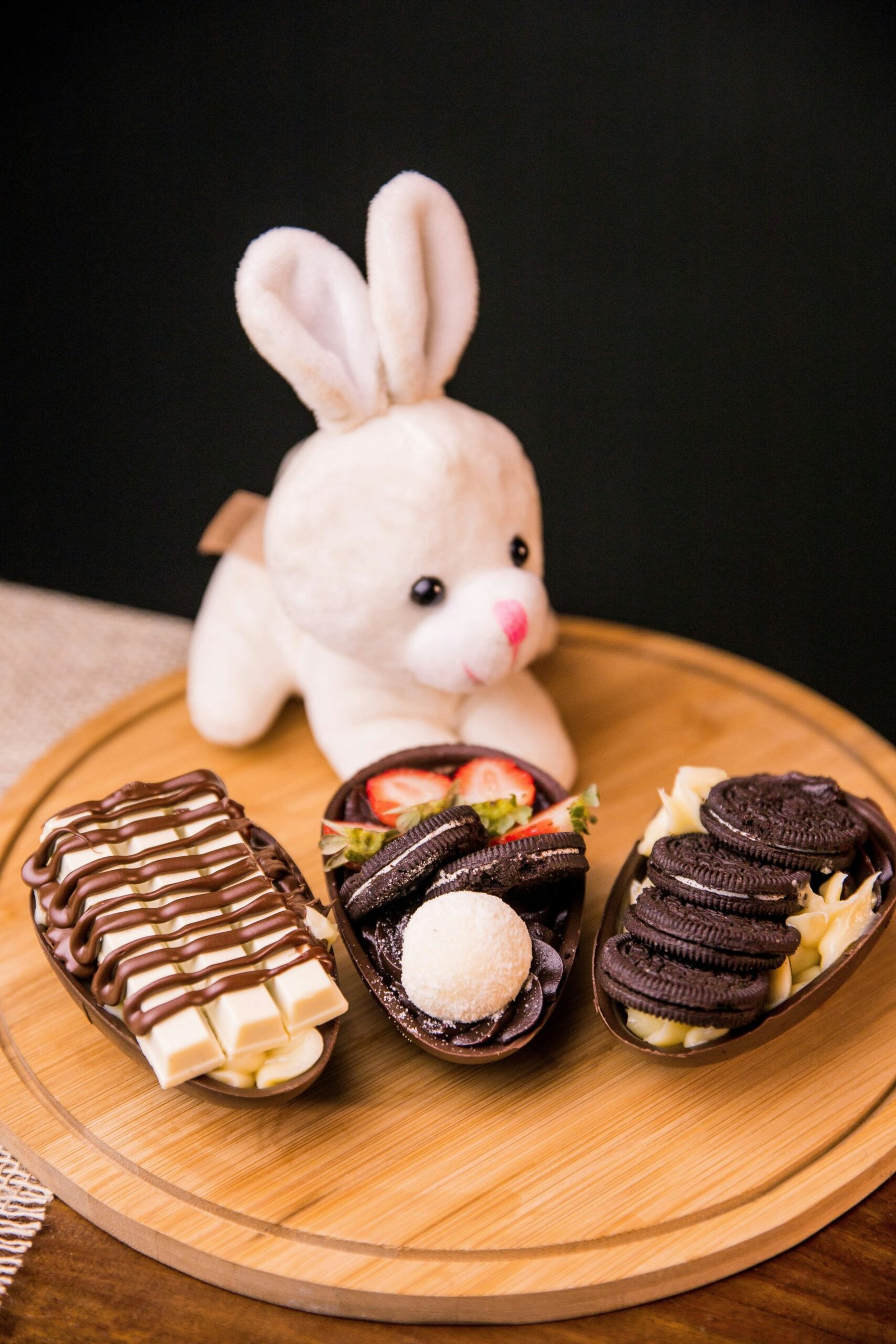 white rabbit plush toy on brown wooden table